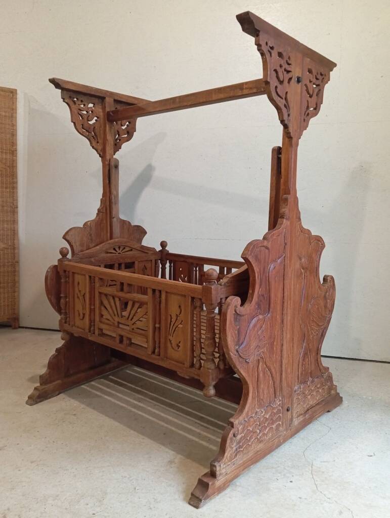Solid teak carved swing cradle