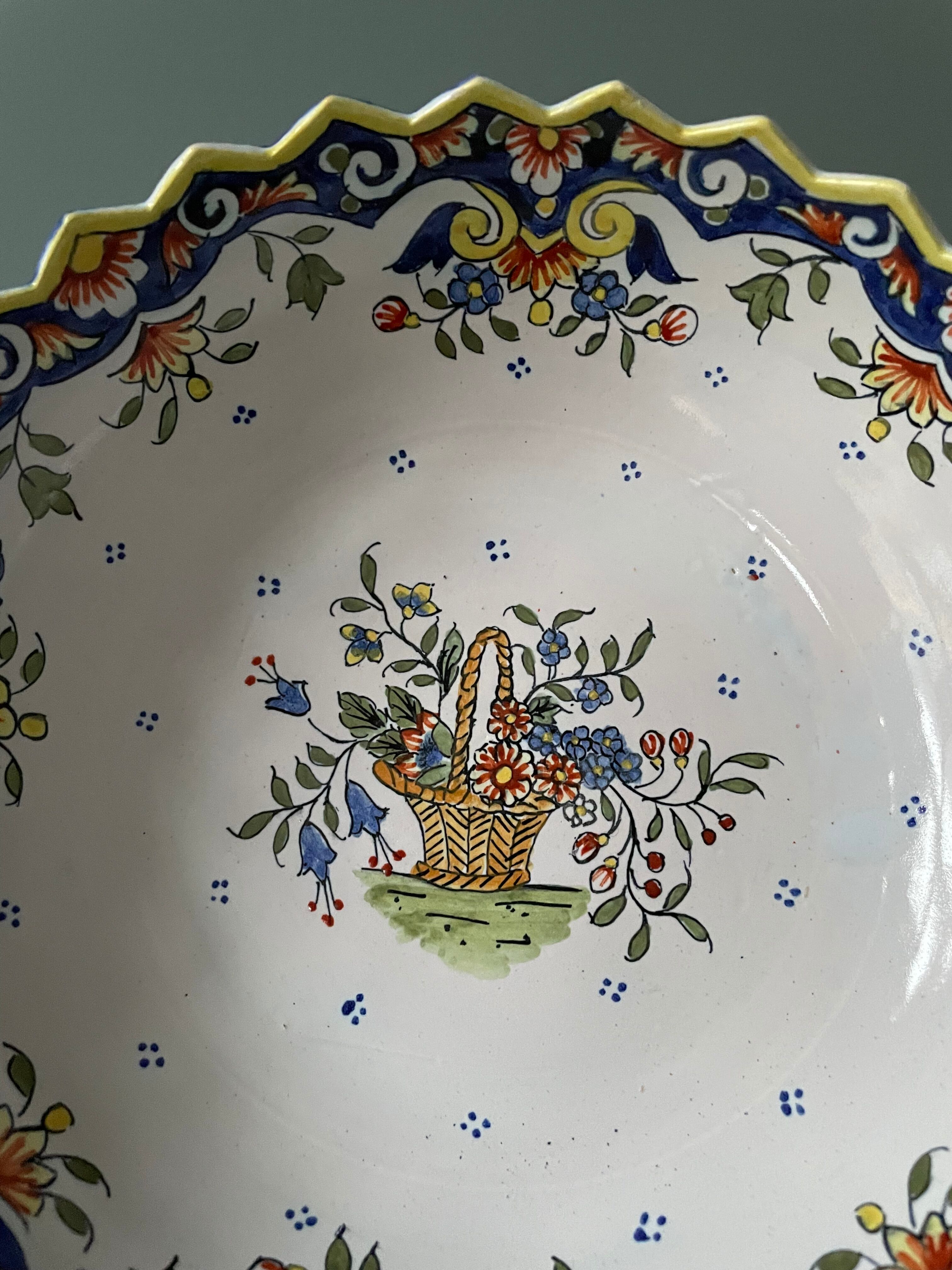 Hollow round dish in Rouen earthenware