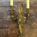 Pair of Louis XV Style wall lights in gilded bronze