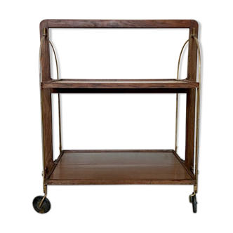 Serves Folding Bocado and on dark wood wheels