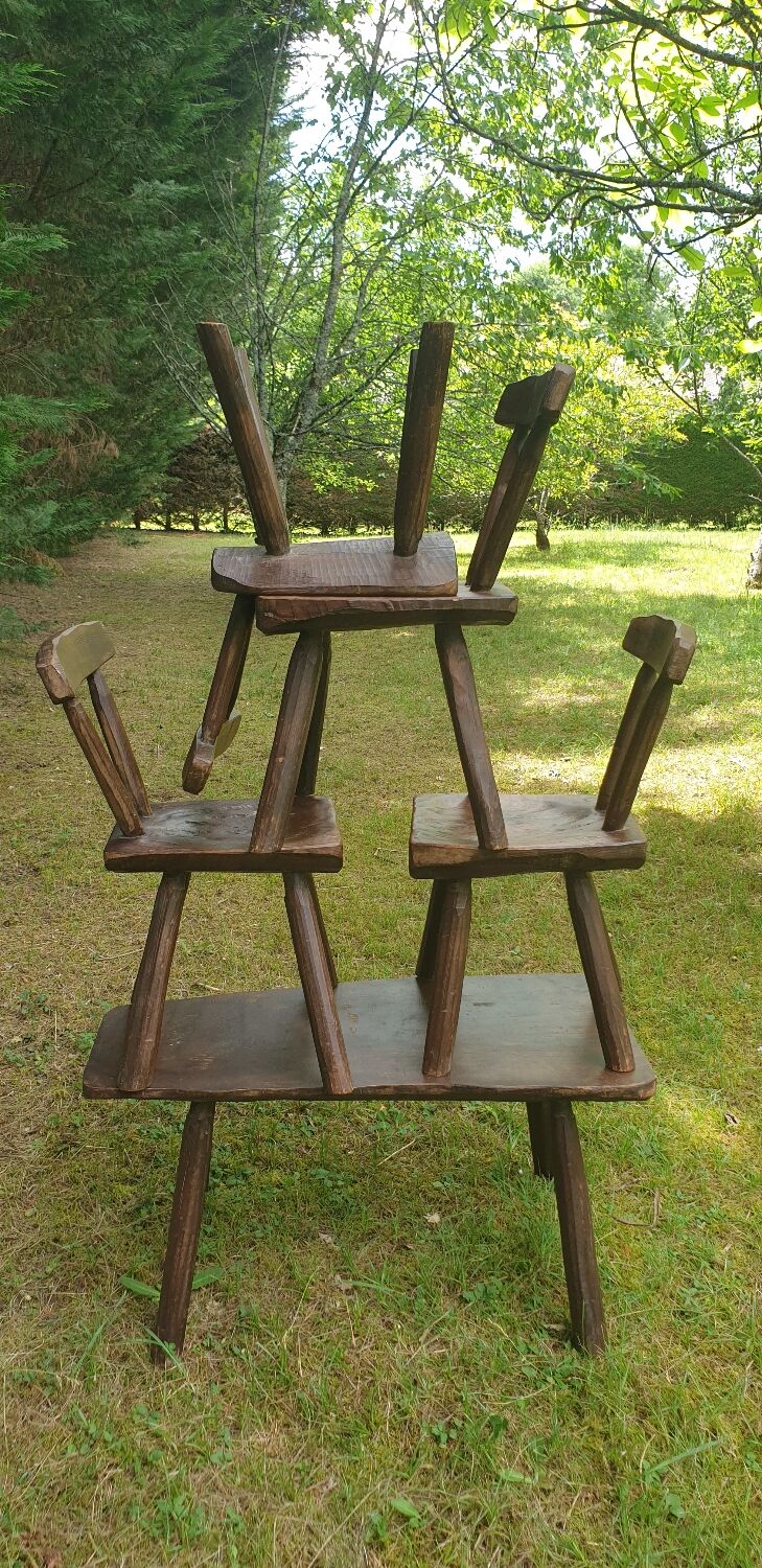 Four chairs and brutalist coffee table
