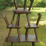 Four chairs and brutalist coffee table