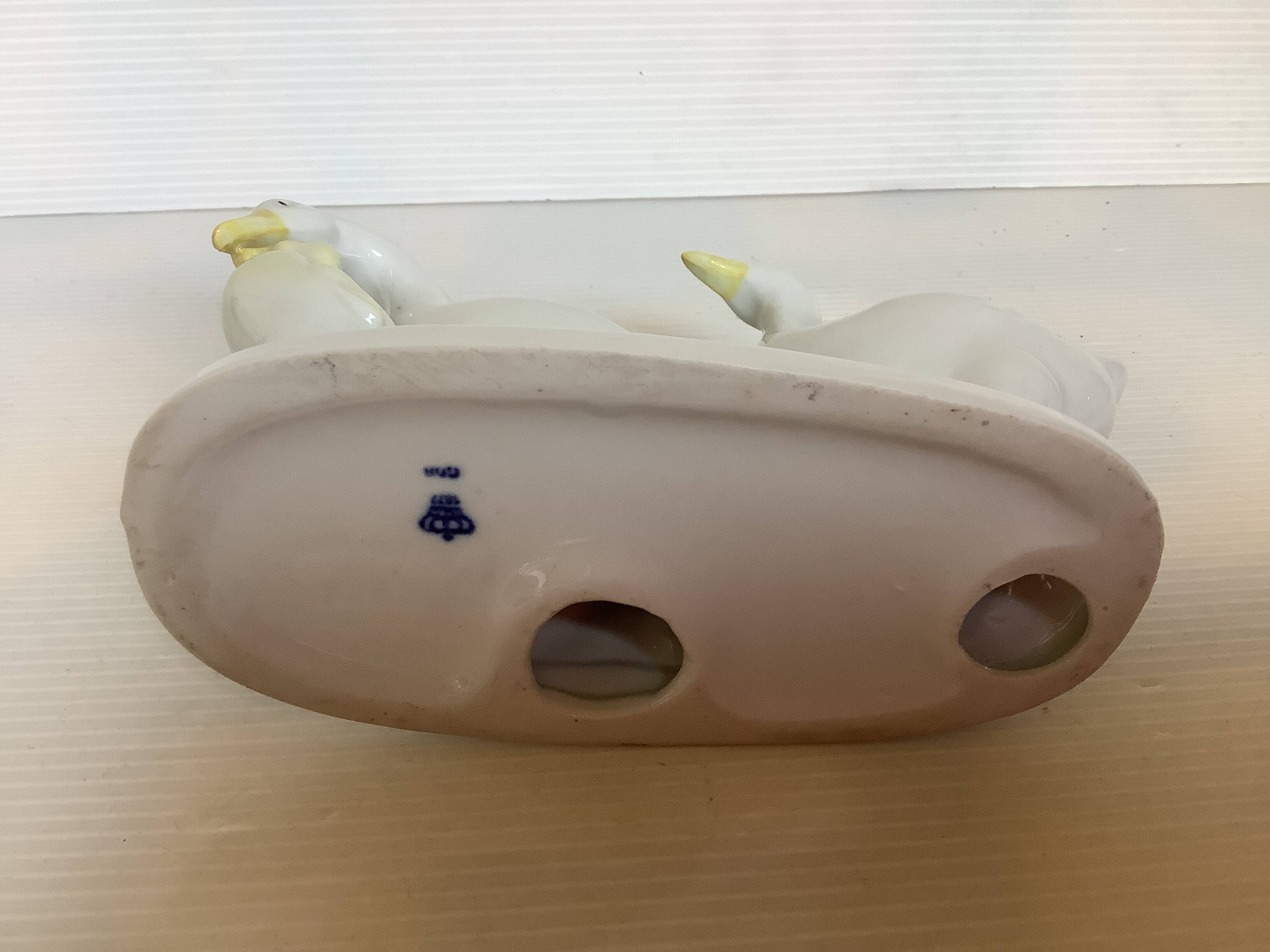 Trio of ceramic geese