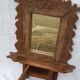Old barber's mirror in teak