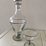 Carafe and its crystal glass.