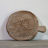 Carved wooden chapatis board