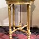 guéridon rond en bois doré, de style Louis XVI