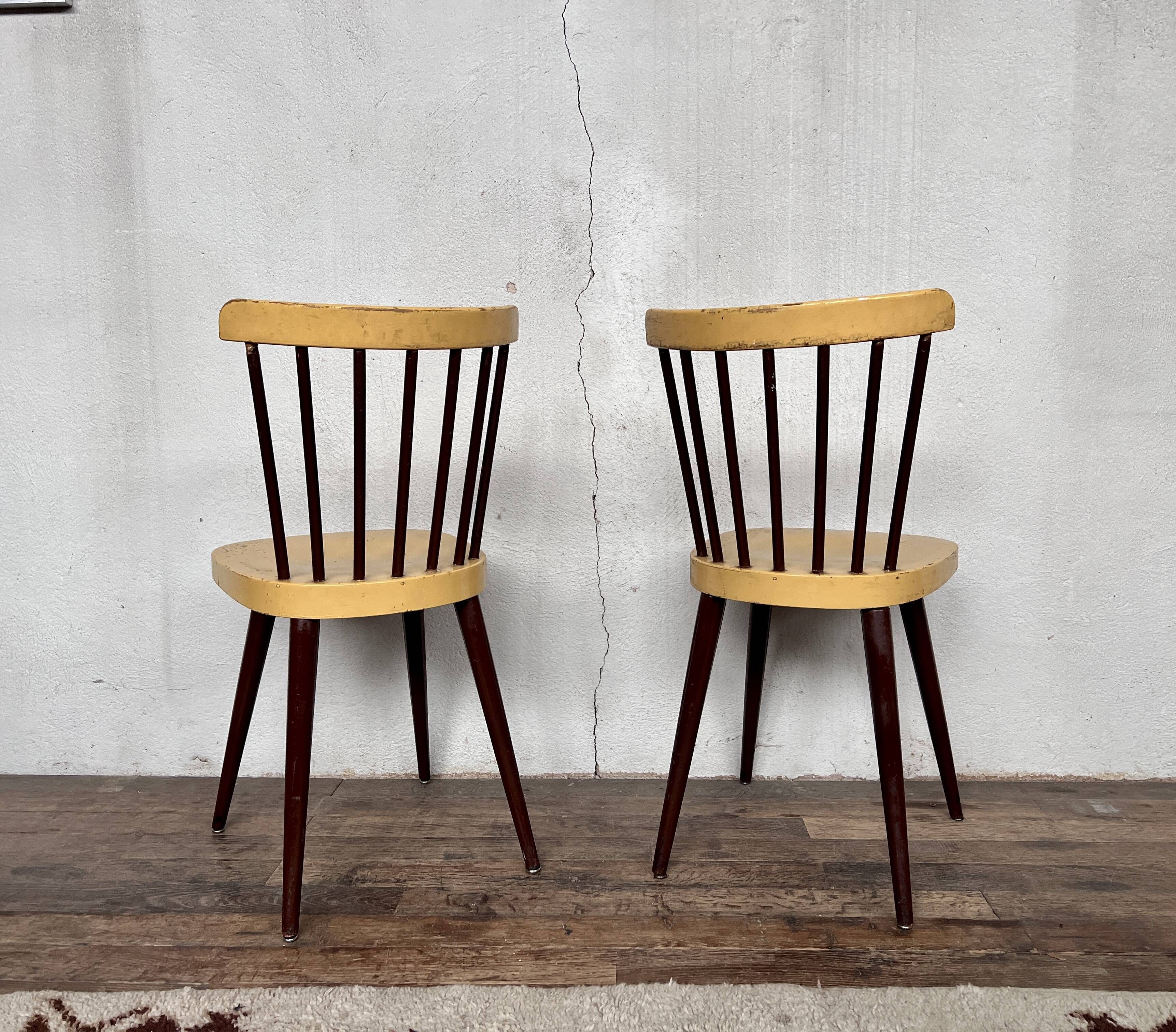 Pair of Baumann bistrot troquet chairs in yellow and brown wood