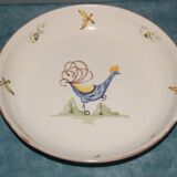 Plat à décor de coq , signé