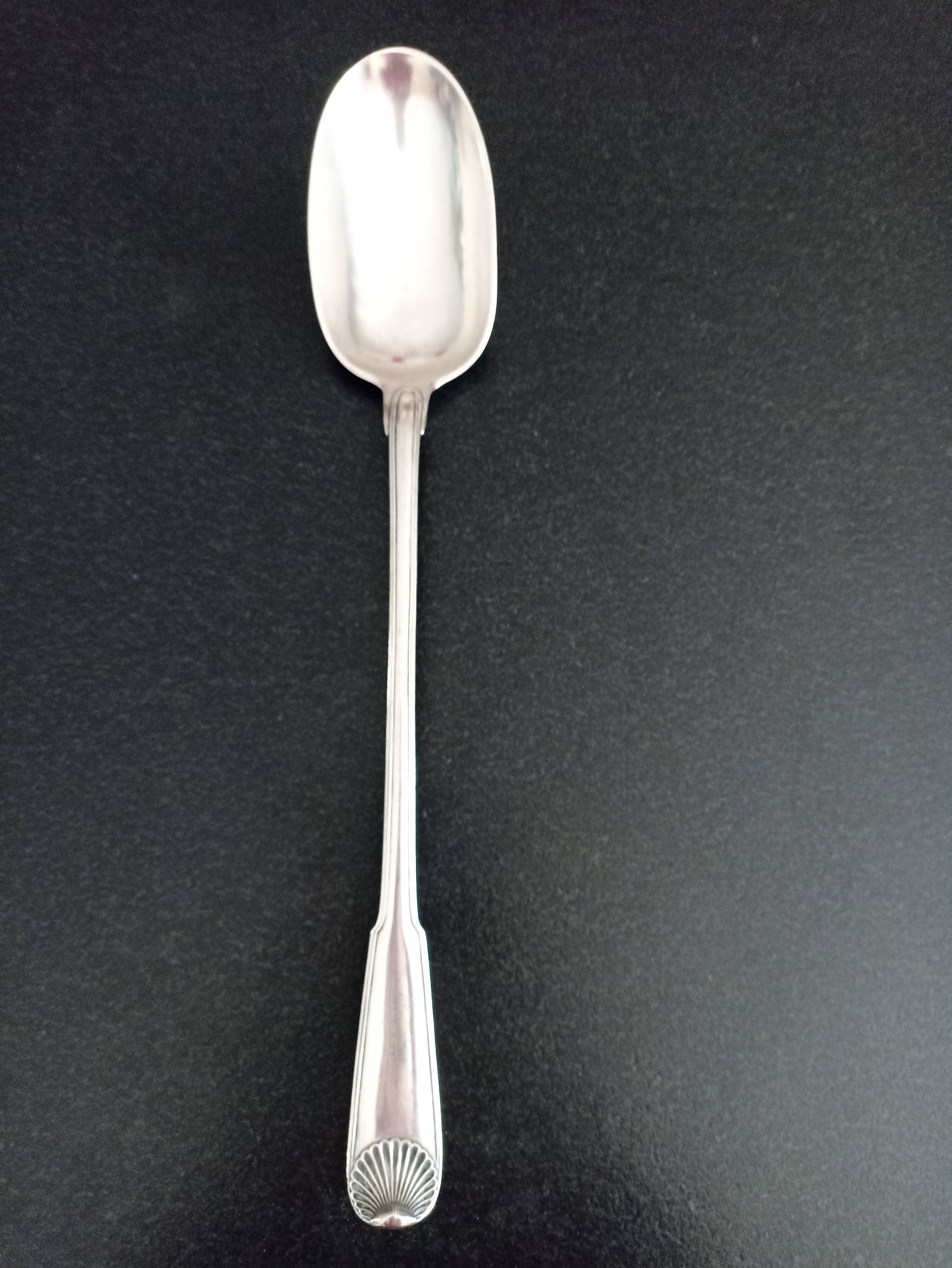 Silver metal serving spoon