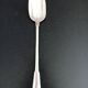 Silver metal serving spoon