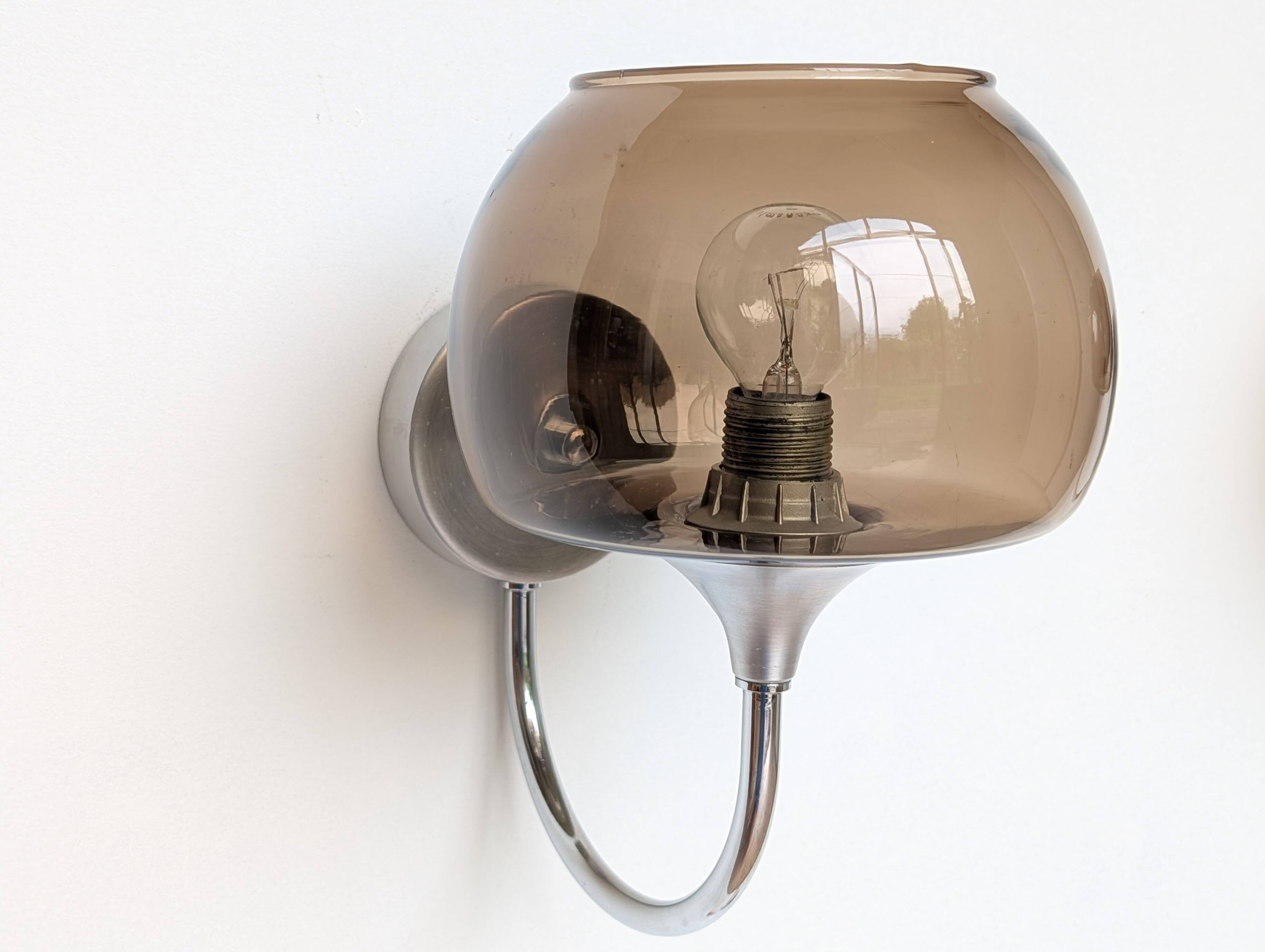 Pair of chrome and glass wall lights