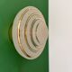 Old glass globe wall/ceiling light in frosted white and gold.