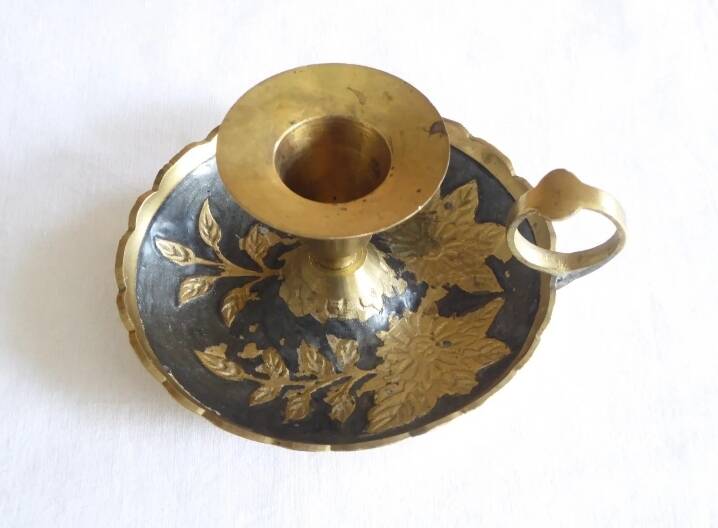 Brass hand candle holder