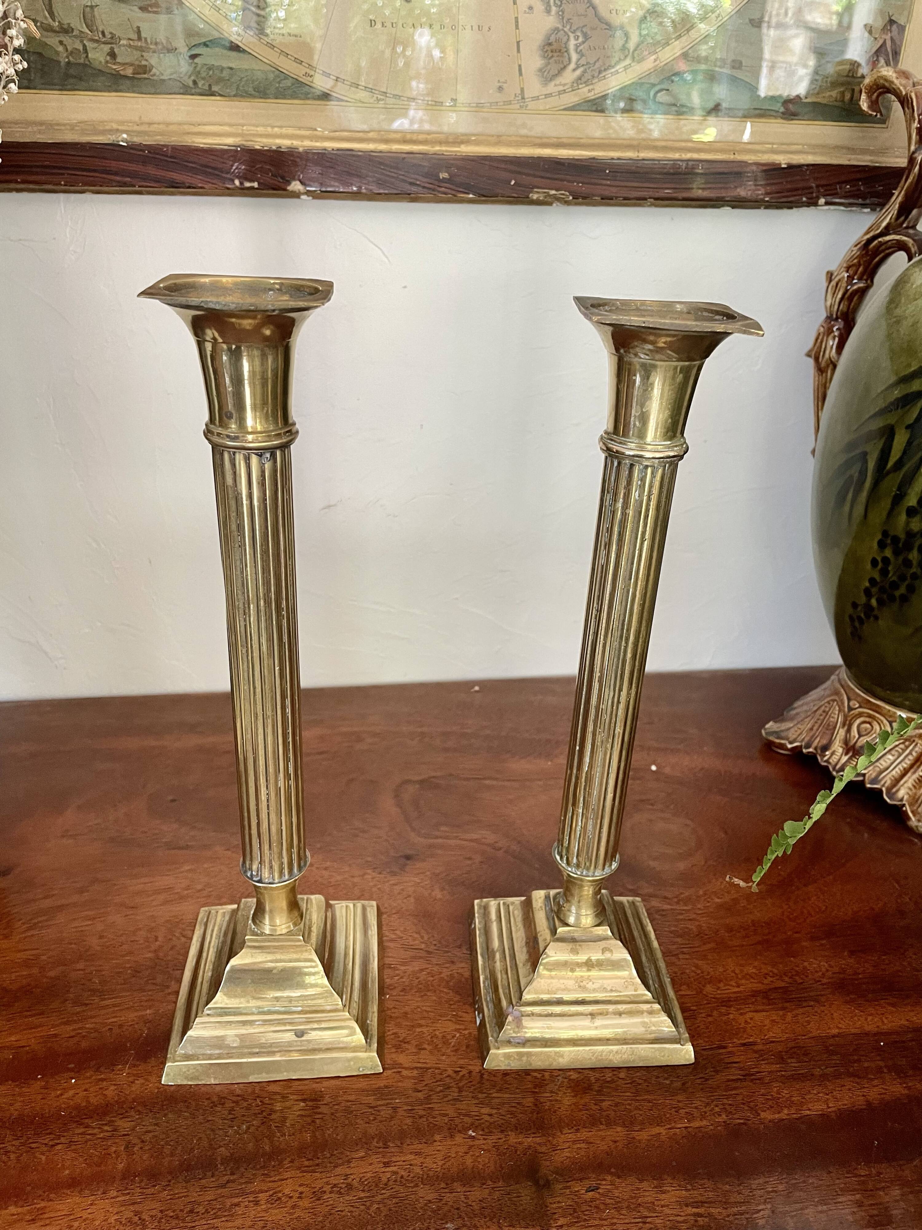 Payroll of brass column candle holders