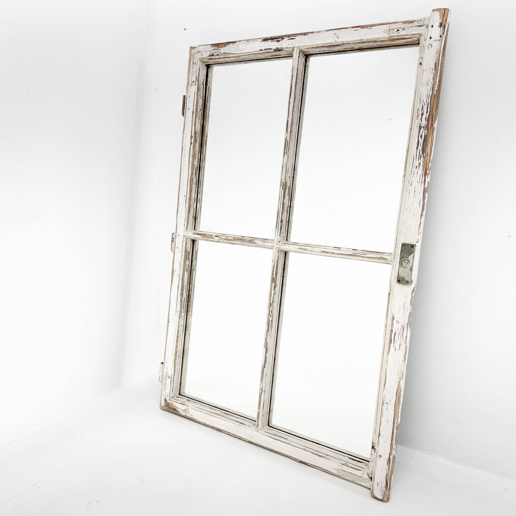 Vintage wooden window converted to a mirror