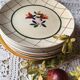 Set of eight plates desserten yellow green and red