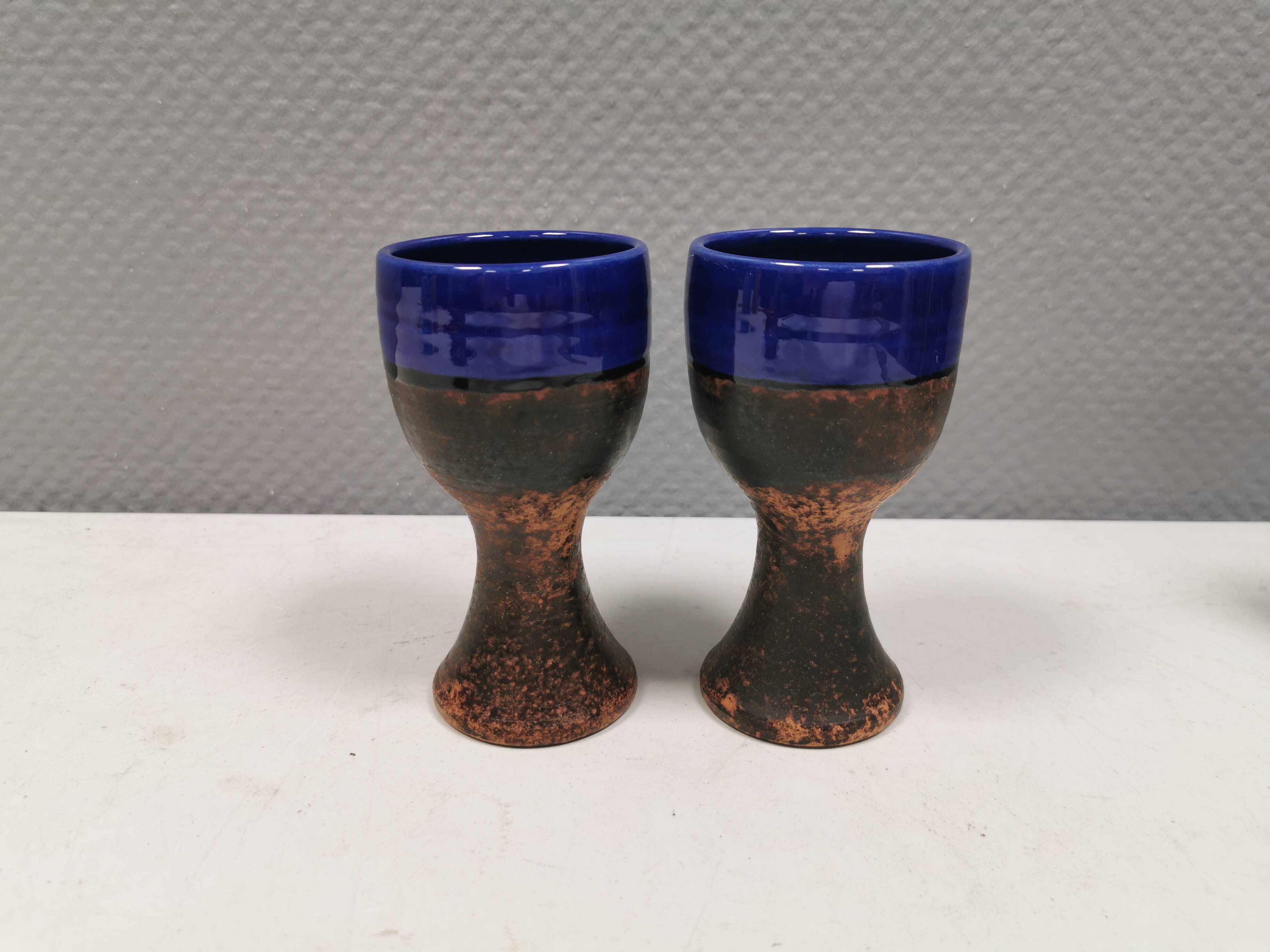 Two mugs in partially blue-glazed ceramic, from Seilast Wisby Sweden