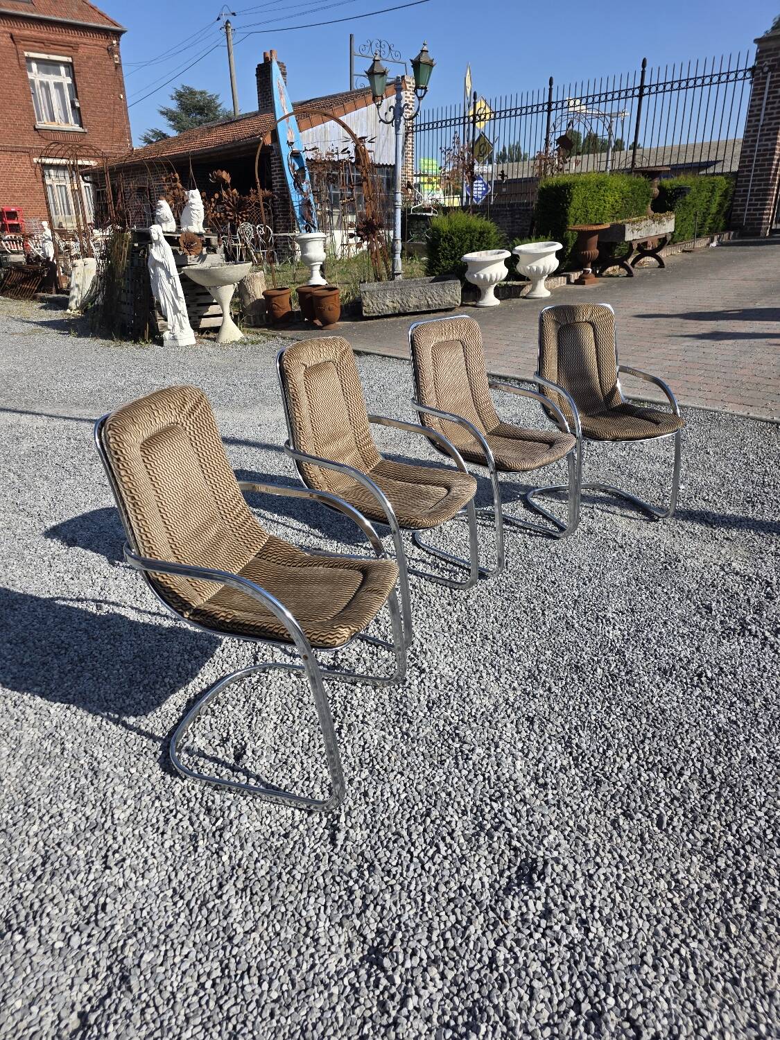 4 chaises Cidue en métal chromé, années 70