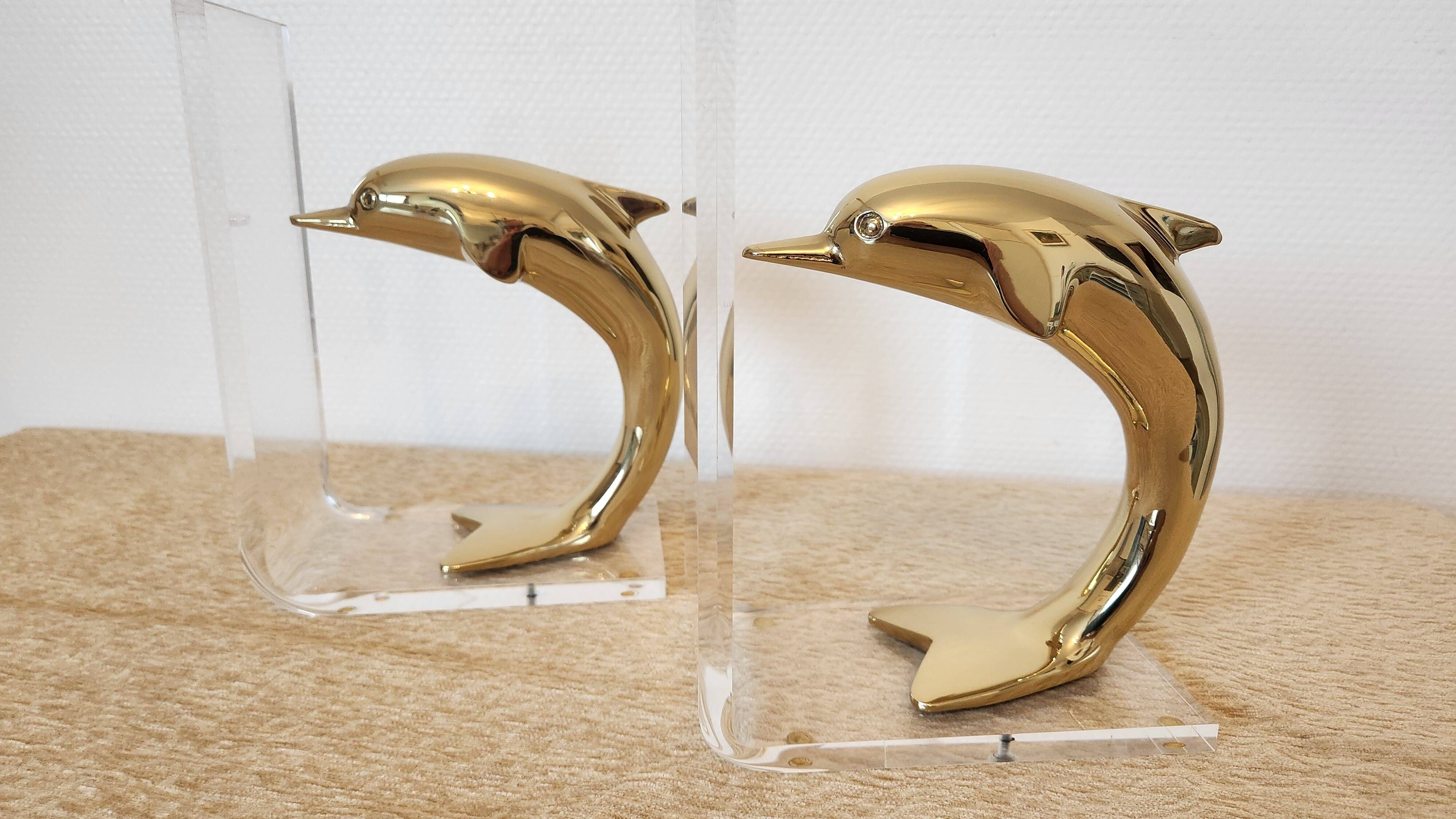 Dolphin bookends in gold metal and plexiglass – 1980s