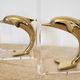 Dolphin bookends in gold metal and plexiglass – 1980s