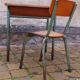 Vintage teak and solid oak schoolwork and its 50 year chair