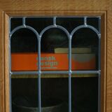 20th-century solid oak display cabinet with a glass front, by a Danish cabinetmaker.