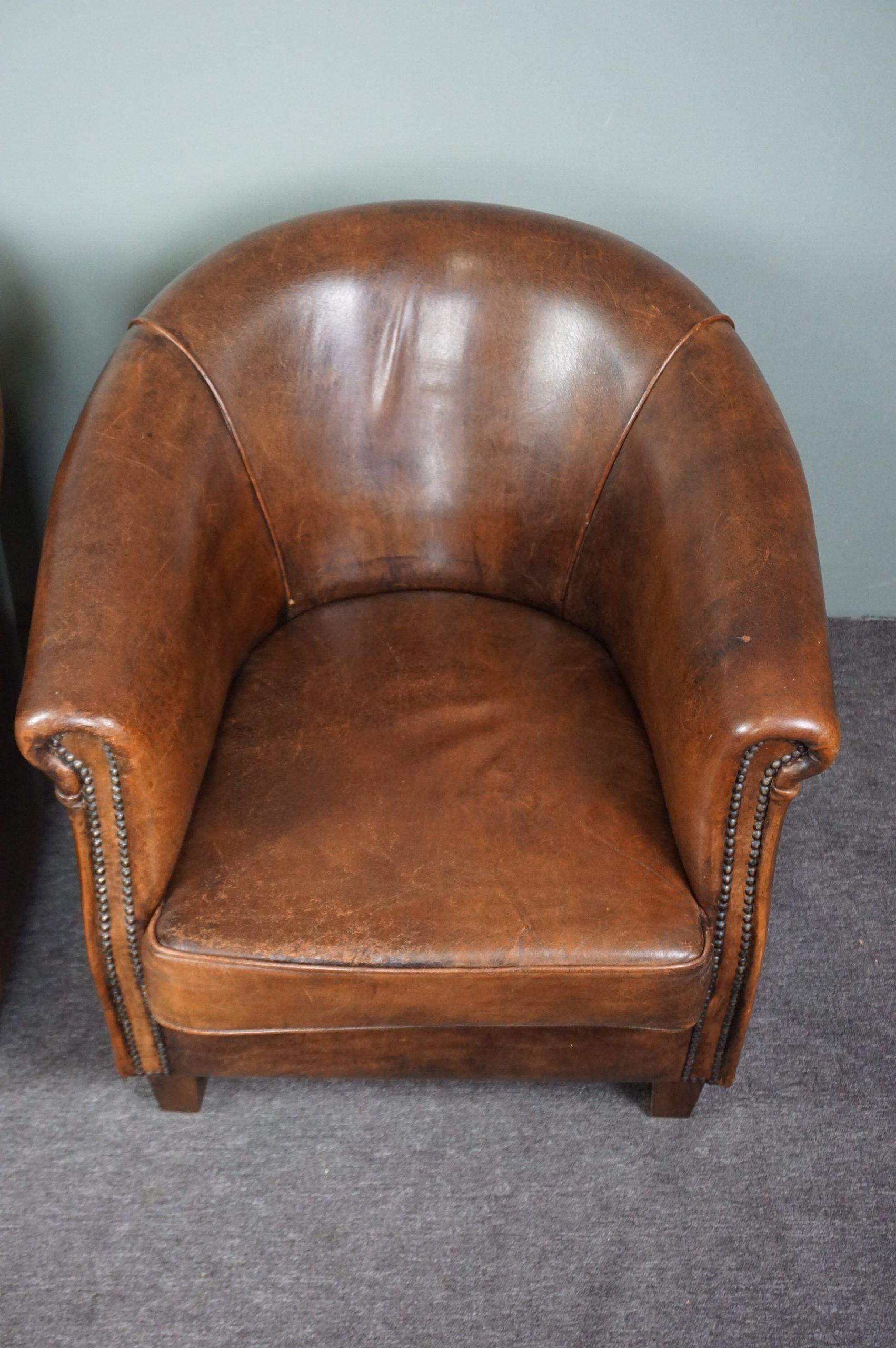 Set of 2 club armchairs in sheep leather