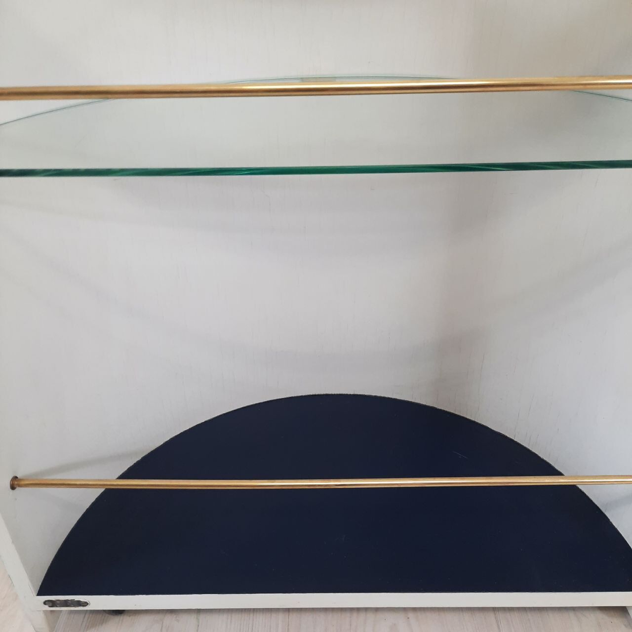 Vintage openable cylinder shaped bar cabinet, wood, brass and glass.