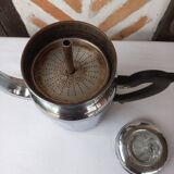 Silver metal coffee maker with glass cap