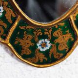 Golden mirror with decor