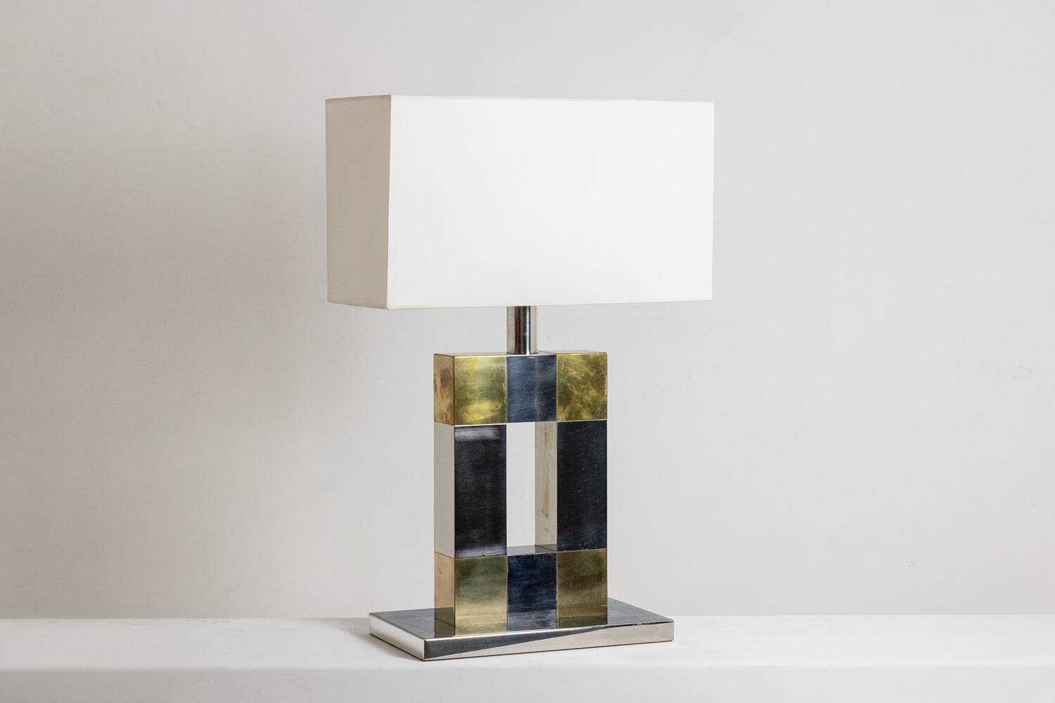 Geometric lamp in silver and gold metal. 1970s.