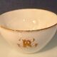 Service à thé en porcelaine (Limoges) 35 pieces monogrammè à liseré doré