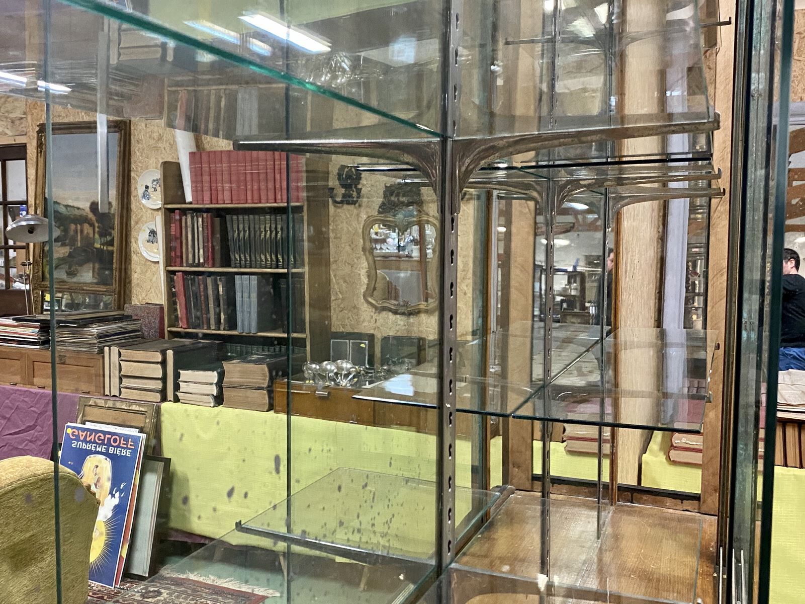 Store window with sliding doors in matte black patinated oak - 30s