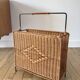 large wicker / rattan and black iron magazine rack from the 70s