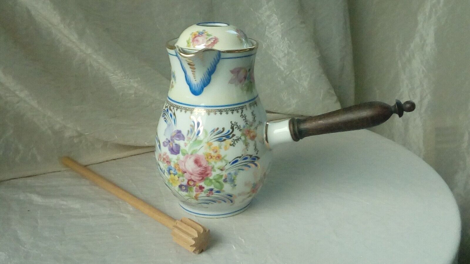 Limoges porcelain chocolatiere with its moussoir