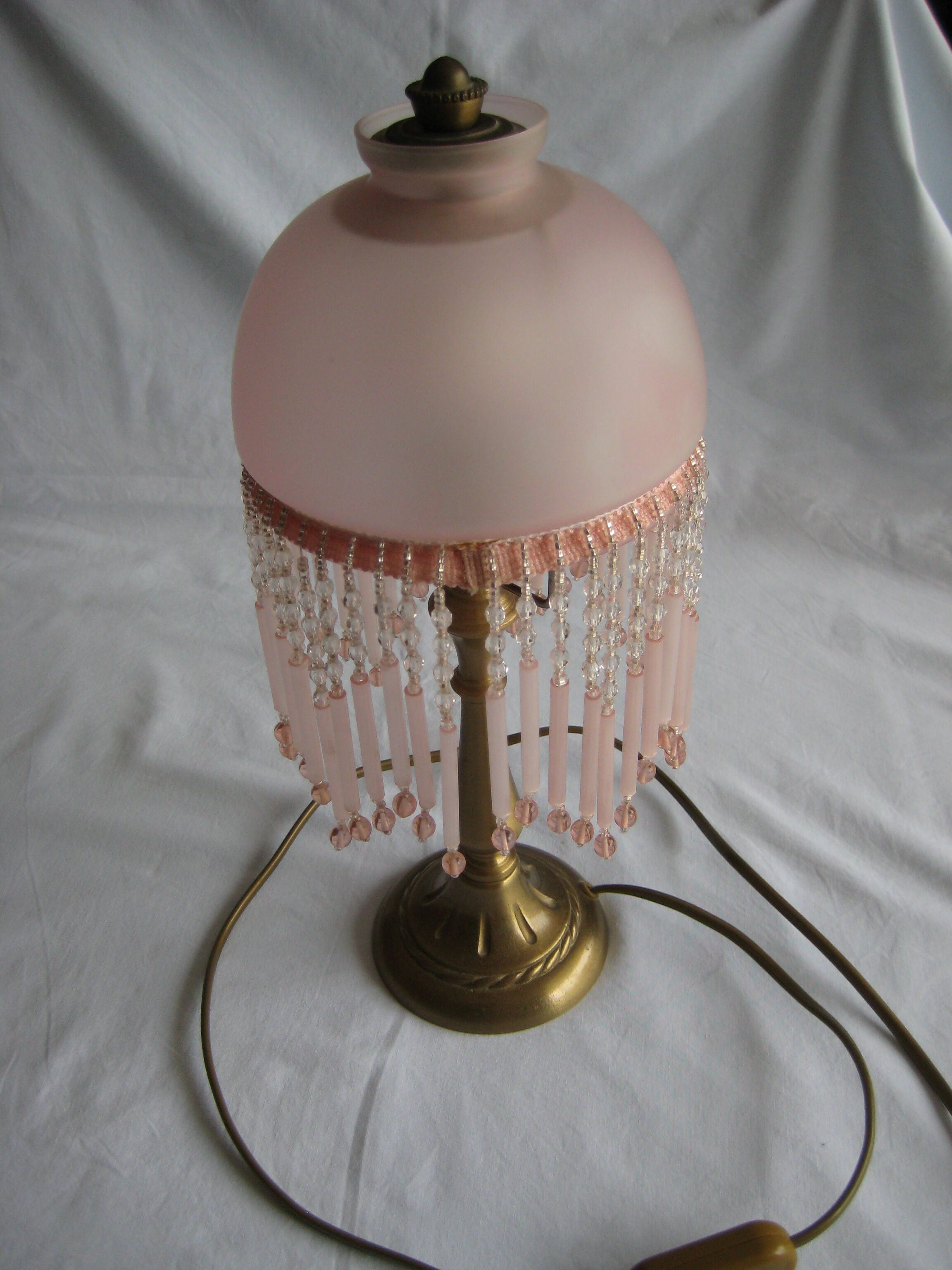 Brass bedside lamp with tassel