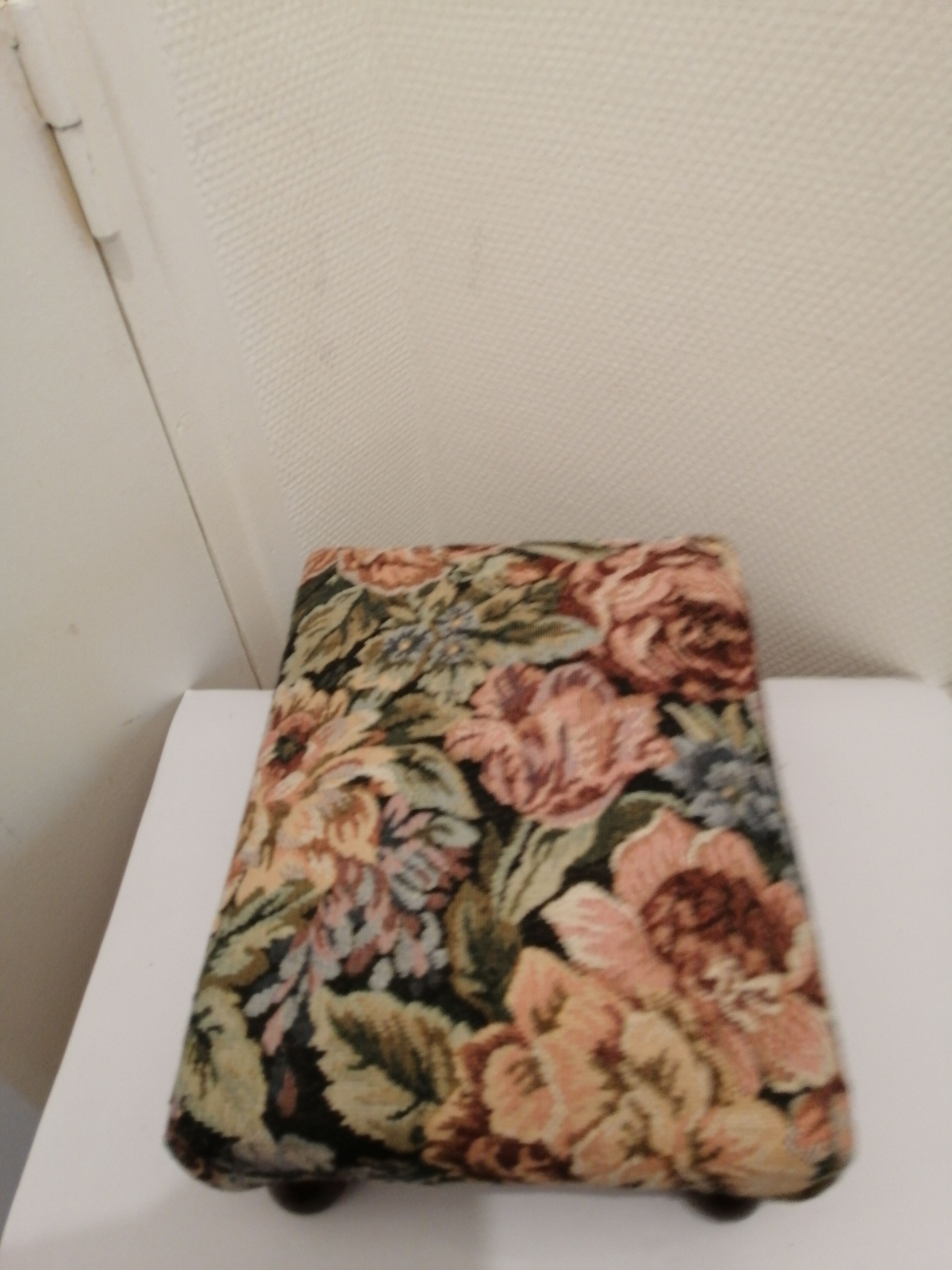 Vintage footrest in wood and fabric