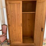 Vintage wardrobe in raw wood