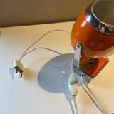 Orange eye ball wall lamp