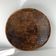 Vintage African tidy in natural wood with carved decoration in flat masks