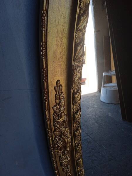 Oval mirror 134cm wood and gilded stucco early 20th century