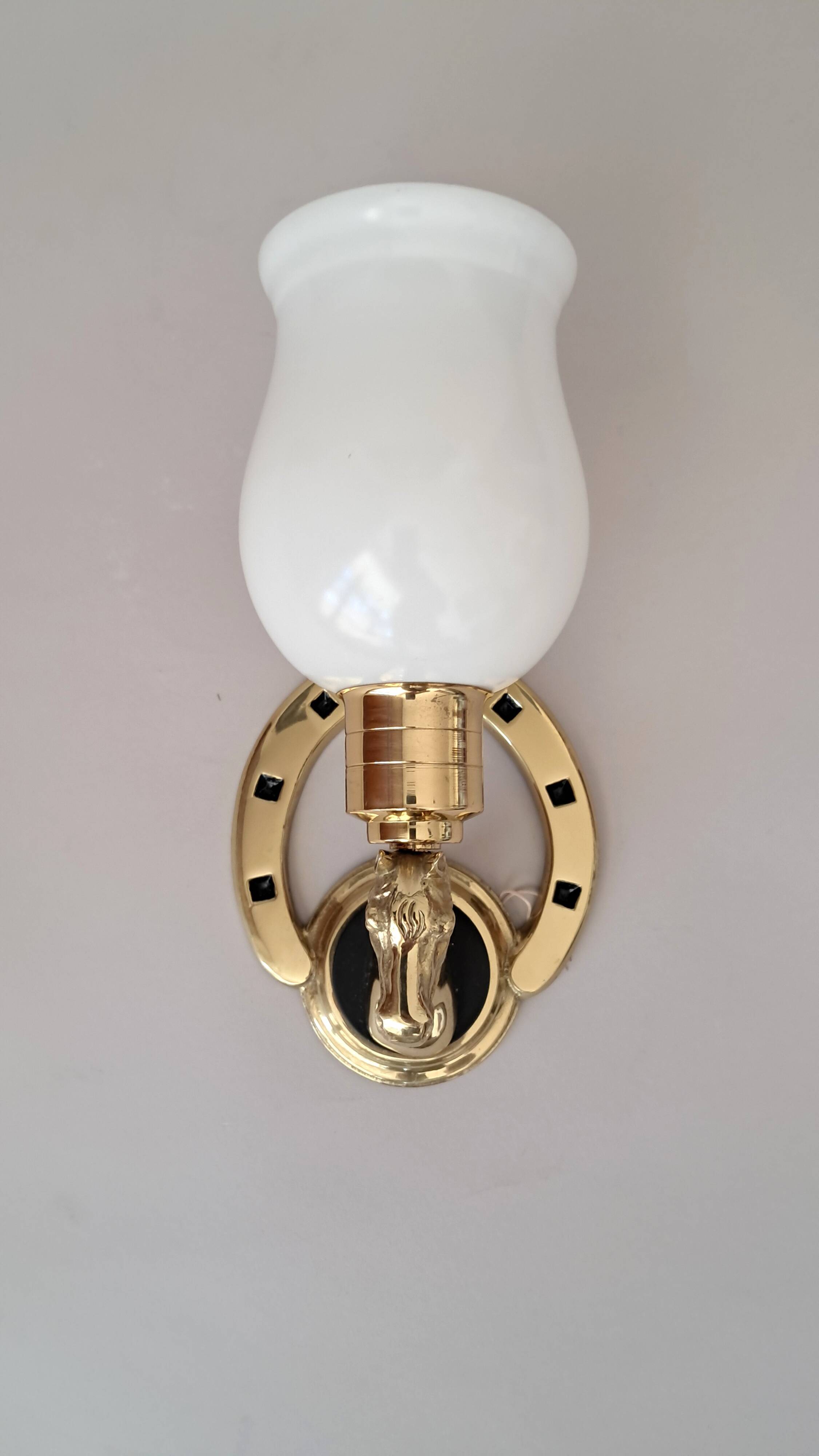Gilded bronze wall lamp with iron and horse head 1950/1960.