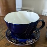 Set of two large Lunéville cups and saucers