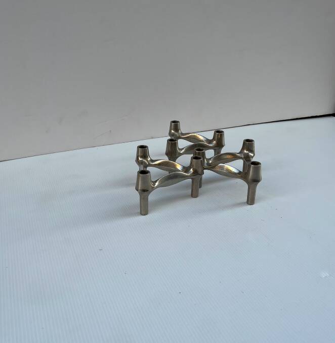 Vintage Stoffnagel candle holders in chrome steel