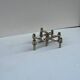 Vintage Stoffnagel candle holders in chrome steel