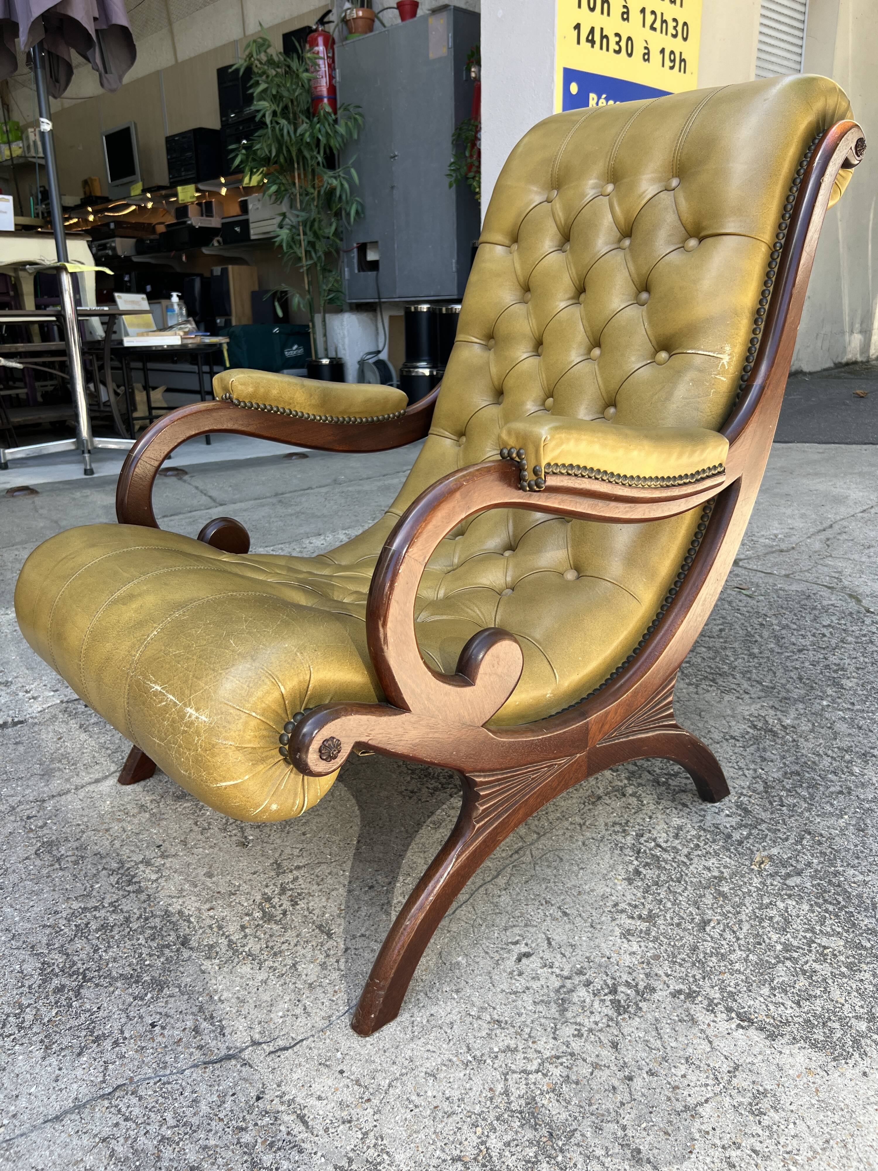 Victoria style green leather chesterfield armchair