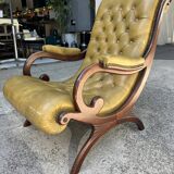 Victoria style green leather chesterfield armchair