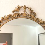 Miroir ovale en laiton style baroque vénitien 51x74cm