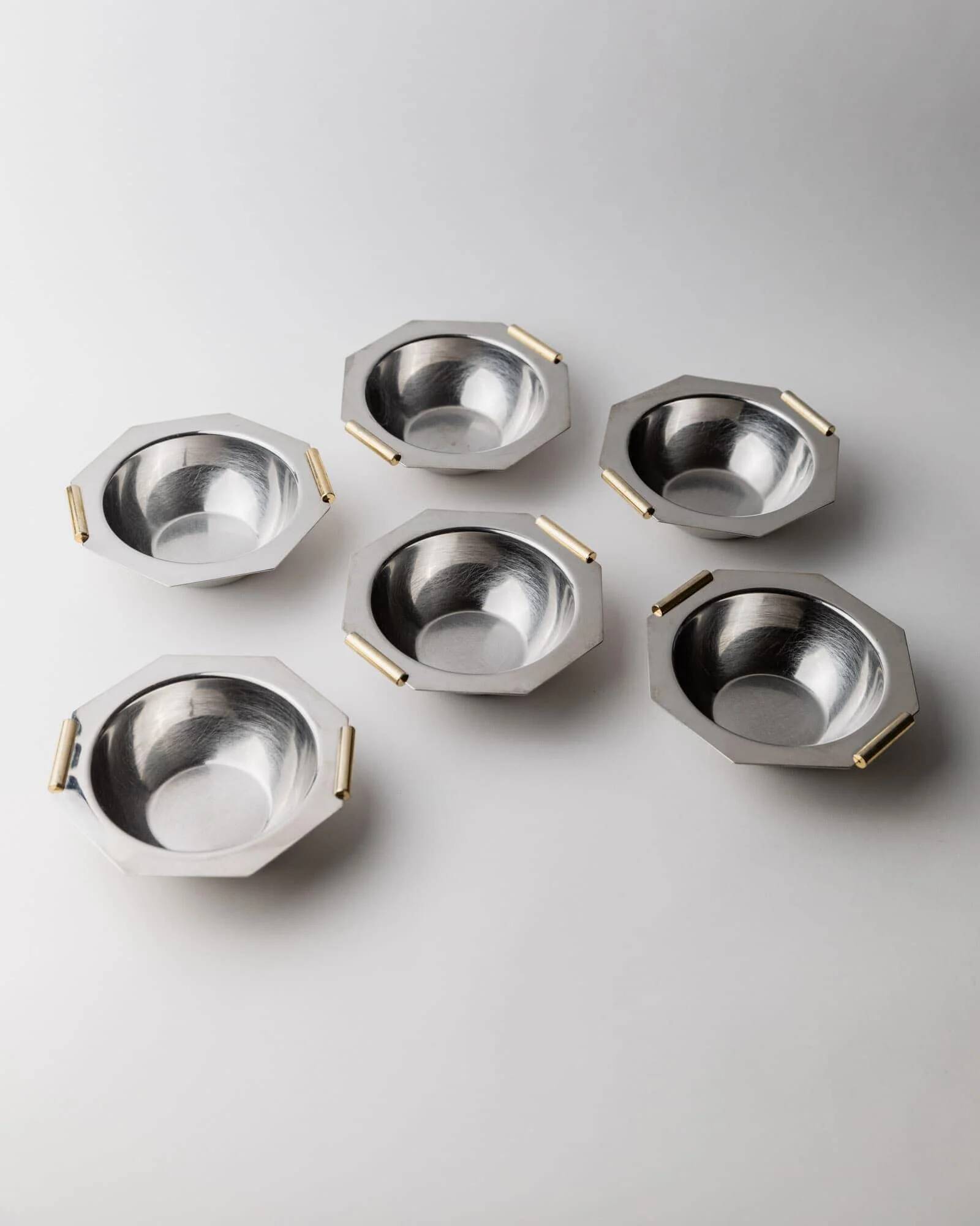 1980s vintage bowls, set of 8, stainless steel with gold handles.